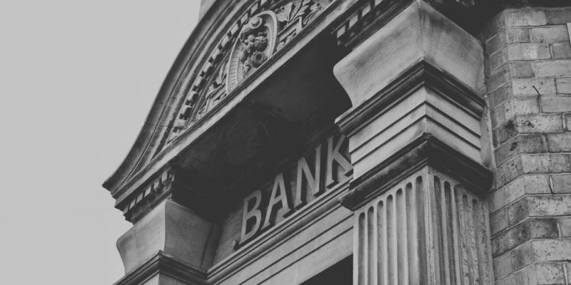 Black and white picture of a bank entrance