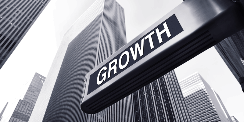 Growth sign with high rise building